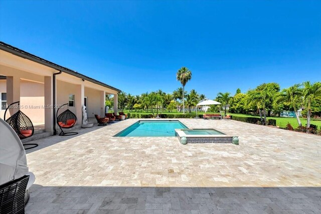4800 SW 141st Ave, Miramar, FL 33027 - view of pool with a patio, a pool with connected hot tub, and a grill