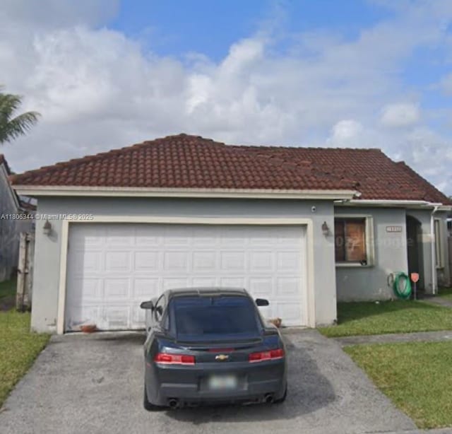 18202 SW 142nd Ct, Miami, FL 33177 - ranch-style house featuring asphalt driveway, stucco siding, and a tiled roof