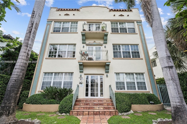 1242 Drexel Ave Unit 103, Miami Beach, FL 33139 - view of building exterior featuring entry steps