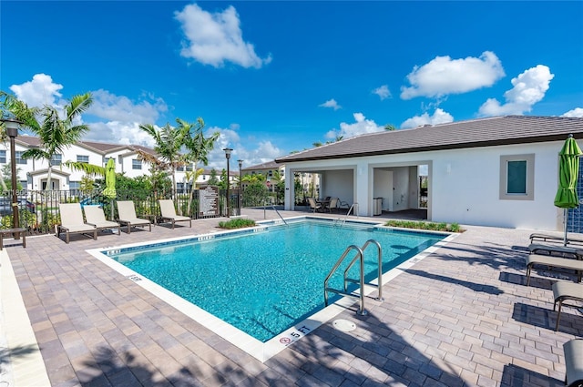 26480 SW 148th Ct Unit 26480, Homestead, FL 33032 - community pool featuring a patio area