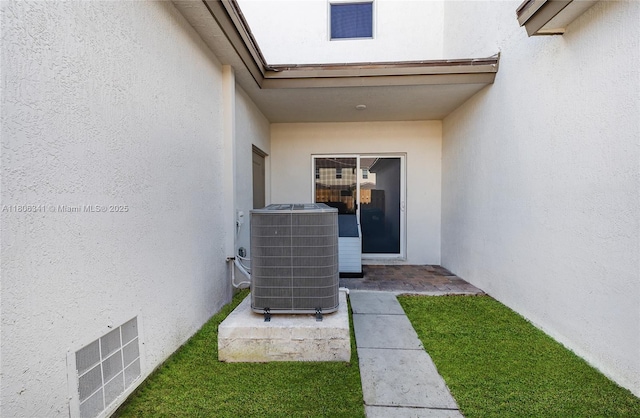 26480 SW 148th Ct Unit 26480, Homestead, FL 33032 - entrance to property with central AC unit and stucco siding