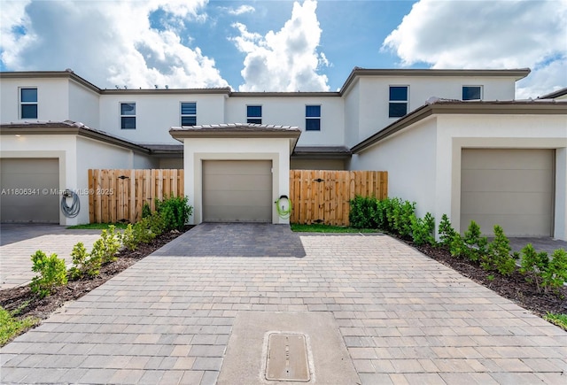 26480 SW 148th Ct Unit 26480, Homestead, FL 33032 - multi unit property featuring decorative driveway, stucco siding, and a garage