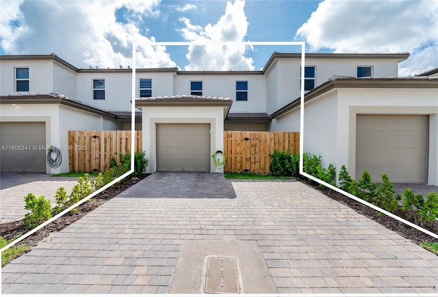 26480 SW 148th Ct Unit 26480, Homestead, FL 33032 - townhome / multi-family property with decorative driveway and stucco siding