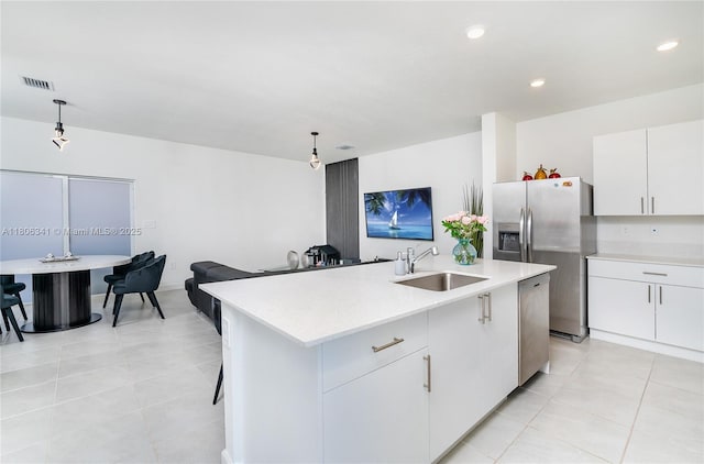 26480 SW 148th Ct Unit 26480, Homestead, FL 33032 - kitchen featuring a sink, stainless steel appliances, light countertops, light tile patterned flooring, and recessed lighting