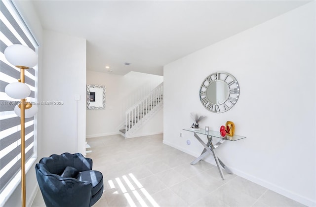 26480 SW 148th Ct Unit 26480, Homestead, FL 33032 - sitting room with stairway, light tile patterned floors, baseboards, and recessed lighting
