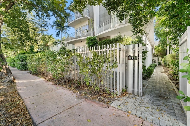 1025 Michigan Ave Unit 1C, Miami Beach, FL 33139 - view of side of home featuring a gate and stucco siding