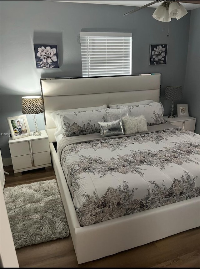 100 NE 171st Ter, Miami, FL 33162 - bedroom with wood finished floors and a ceiling fan