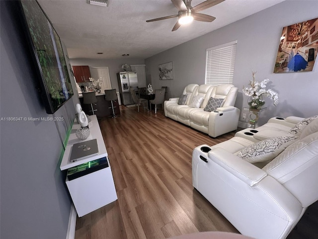 100 NE 171st Ter, Miami, FL 33162 - living room featuring ceiling fan and wood finished floors