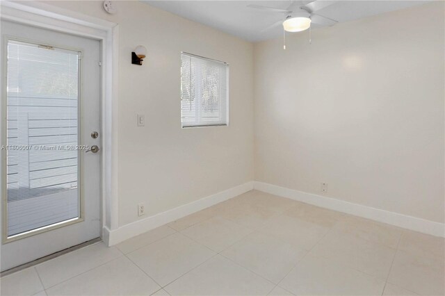 1415 Coolidge St, Hollywood, FL 33020 - unfurnished room featuring baseboards, ceiling fan, light tile patterned floors, and a smoke detector