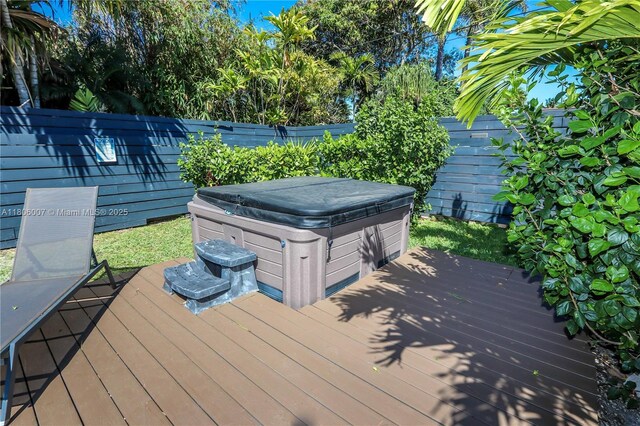 1415 Coolidge St, Hollywood, FL 33020 - wooden terrace featuring a hot tub