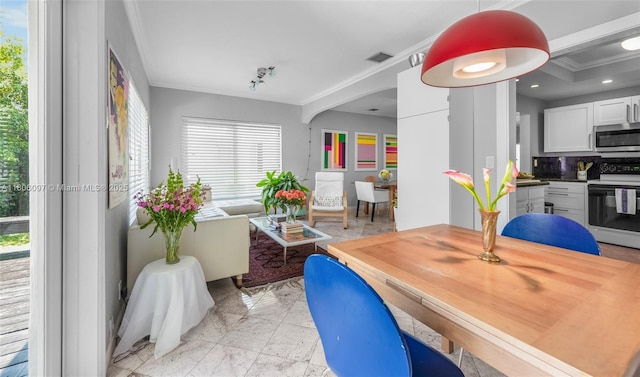9057 Emerson Ave, Surfside, FL 33154 - dining space featuring crown molding, recessed lighting, and light marble finish floors