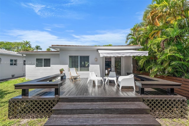 9057 Emerson Ave, Surfside, FL 33154 - wooden deck with french doors