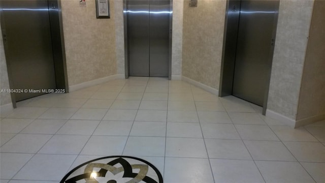 1400 Saint Charles Pl Unit 516, Pembroke Pines, FL 33026 - hall with elevator and tile patterned flooring