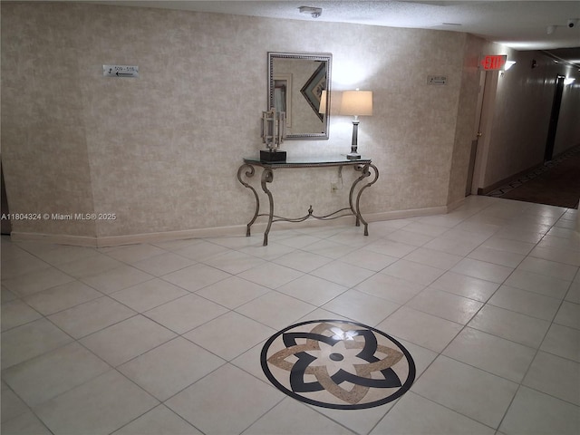 1400 Saint Charles Pl Unit 516, Pembroke Pines, FL 33026 - hall with light tile patterned floors and baseboards