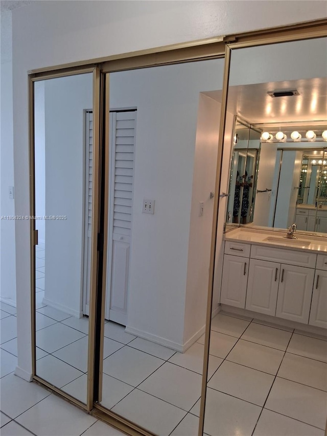 1400 Saint Charles Pl Unit 516, Pembroke Pines, FL 33026 - bathroom featuring tile patterned floors, vanity, and baseboards