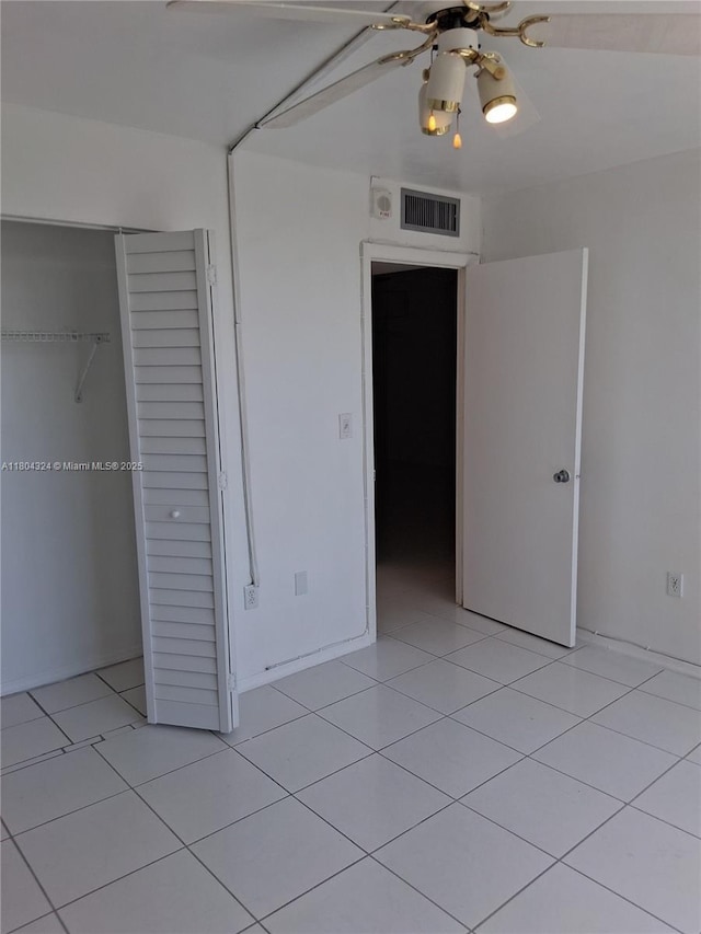 1400 Saint Charles Pl Unit 516, Pembroke Pines, FL 33026 - unfurnished bedroom with light tile patterned floors and a closet