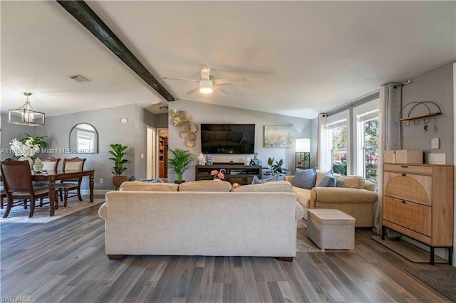 4018 Caloosa Loop, La Belle, FL 33935 - living area with dark wood-type flooring, ceiling fan, and a chandelier
