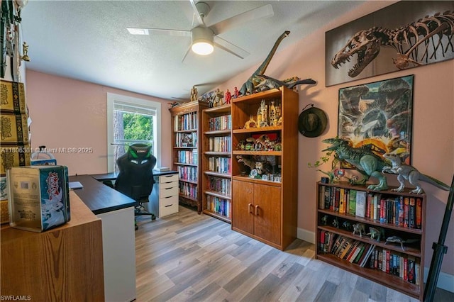 4018 Caloosa Loop, La Belle, FL 33935 - office area featuring ceiling fan, wood finished floors, and a textured ceiling