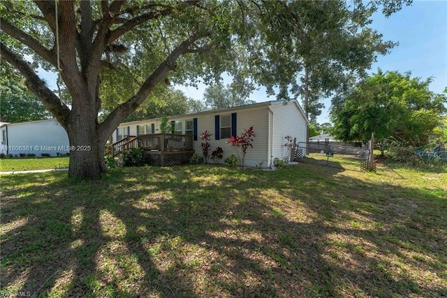 4018 Caloosa Loop, La Belle, FL 33935 - view of yard with a wooden deck
