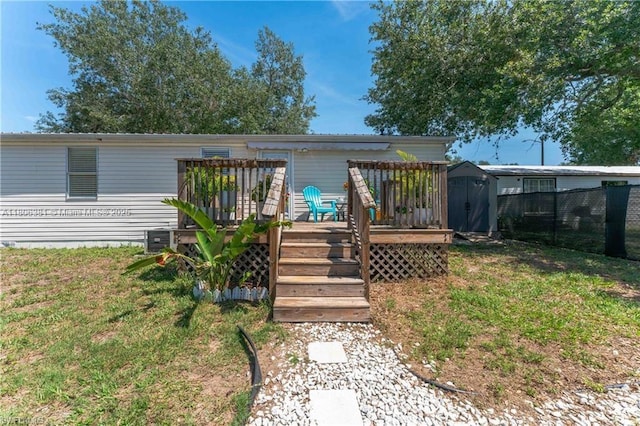 4018 Caloosa Loop, La Belle, FL 33935 - view of front of house featuring a wooden deck