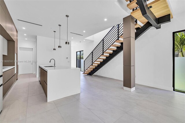 1233 NE 12th Ave Unit B, Fort Lauderdale, FL 33304 - contemporary home with an attached garage and driveway