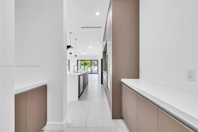1233 NE 12th Ave Unit B, Fort Lauderdale, FL 33304 - corridor with recessed lighting and light tile patterned floors