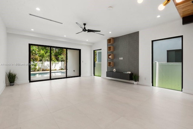 1233 NE 12th Ave Unit B, Fort Lauderdale, FL 33304 - unfurnished room with ceiling fan, recessed lighting, and an accent wall