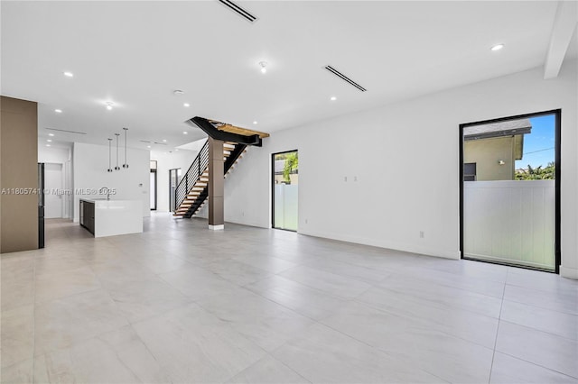 1233 NE 12th Ave Unit B, Fort Lauderdale, FL 33304 - unfurnished living room with stairway, recessed lighting, and light tile patterned floors