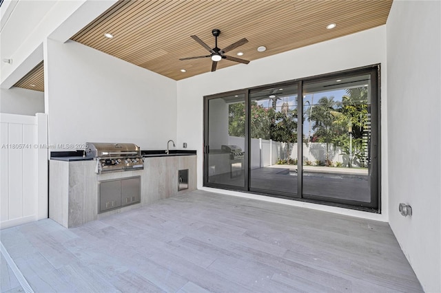 1233 NE 12th Ave Unit B, Fort Lauderdale, FL 33304 - view of patio with exterior kitchen and ceiling fan