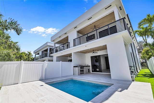 1233 NE 12th Ave Unit B, Fort Lauderdale, FL 33304 - back of house with ceiling fan, a balcony, stucco siding, area for grilling, and a patio area