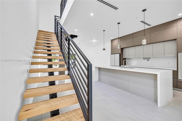 1233 NE 12th Ave Unit B, Fort Lauderdale, FL 33304 - view of swimming pool featuring a fenced backyard and a patio area