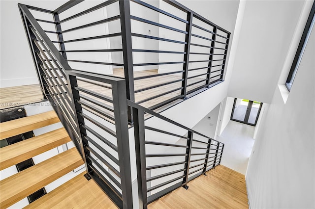1233 NE 12th Ave Unit B, Fort Lauderdale, FL 33304 - staircase featuring wood finished floors