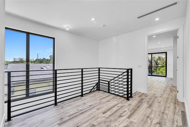 1233 NE 12th Ave Unit B, Fort Lauderdale, FL 33304 - spare room with wood finished floors and recessed lighting
