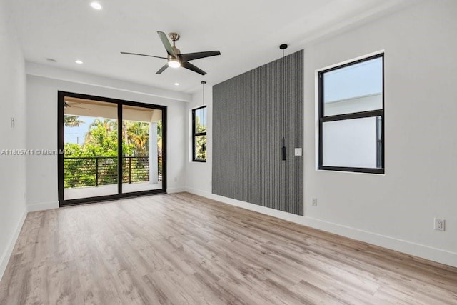 1233 NE 12th Ave Unit B, Fort Lauderdale, FL 33304 - unfurnished room with wood finished floors, a ceiling fan, and recessed lighting