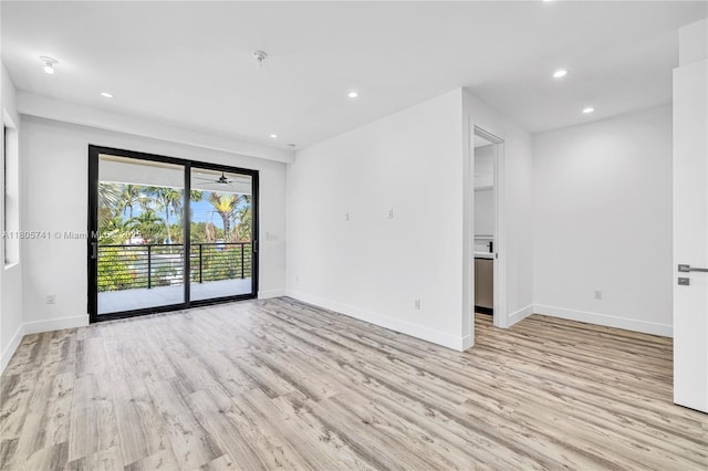 1233 NE 12th Ave Unit B, Fort Lauderdale, FL 33304 - spare room featuring light wood-style floors, recessed lighting, and a pendent fire sprinkler
