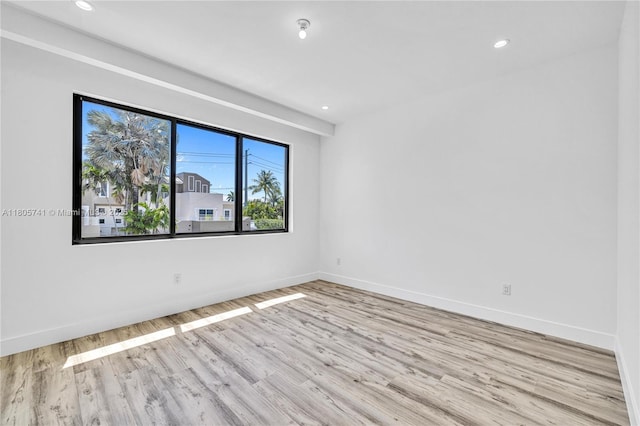 1233 NE 12th Ave Unit B, Fort Lauderdale, FL 33304 - spare room featuring wood finished floors and recessed lighting
