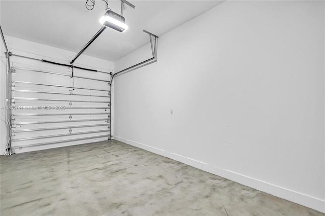 1233 NE 12th Ave Unit B, Fort Lauderdale, FL 33304 - garage with a garage door opener and baseboards