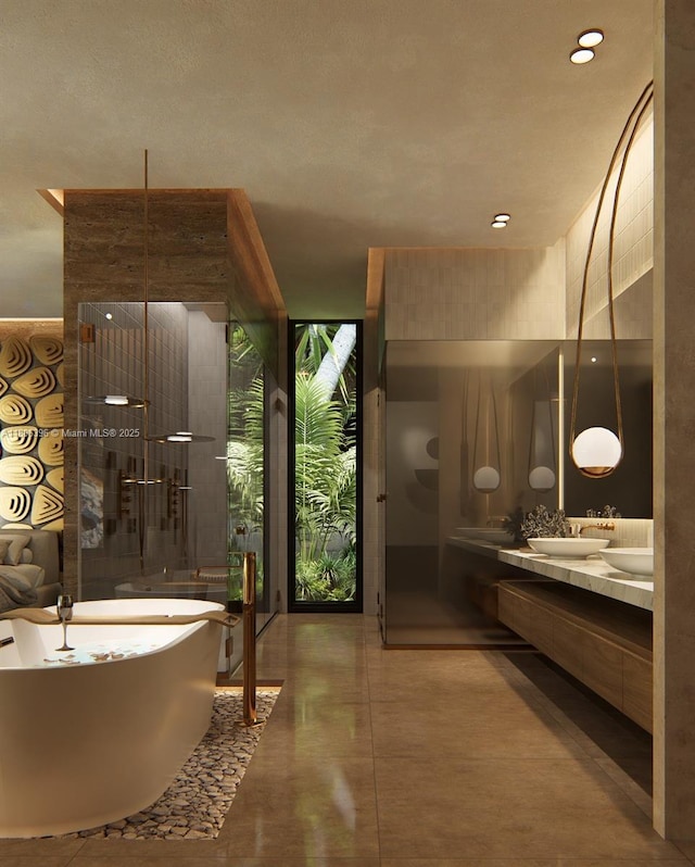 1210 NE 97th St, Miami Shores, FL 33138 - bathroom featuring a freestanding bath, double vanity, and a shower
