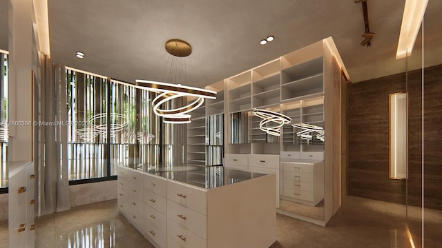1210 NE 97th St, Miami Shores, FL 33138 - spacious closet featuring light tile patterned floors and a chandelier