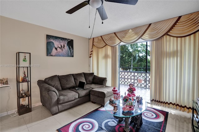 4222 Inverrary Blvd Unit 4213, Lauderhill, FL 33319 - living area with a ceiling fan, baseboards, and light tile patterned floors