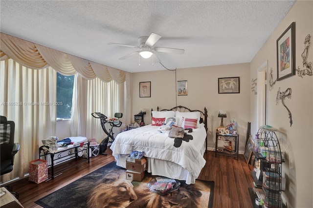 4222 Inverrary Blvd Unit 4213, Lauderhill, FL 33319 - bedroom featuring wood finished floors, a textured ceiling, and a ceiling fan