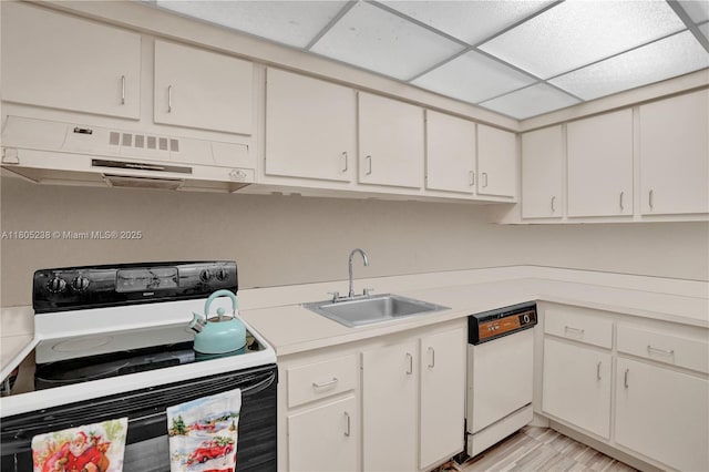 4222 Inverrary Blvd Unit 4213, Lauderhill, FL 33319 - kitchen featuring electric range oven, exhaust hood, white dishwasher, a sink, and light countertops