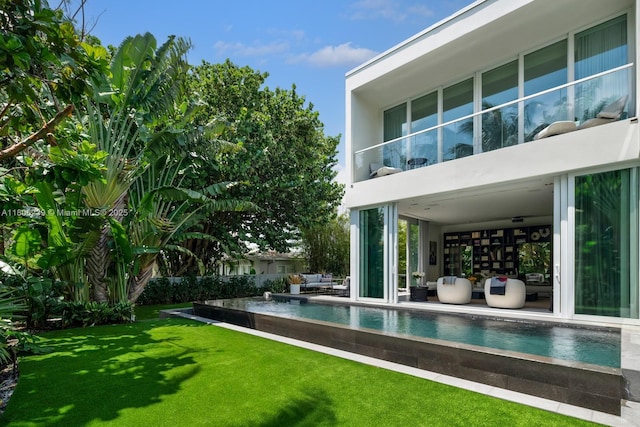 4700 N Meridian Ave, Miami Beach, FL 33140 - swimming pool featuring a yard and outdoor lounge area