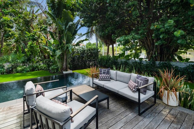 4700 N Meridian Ave, Miami Beach, FL 33140 - wooden terrace with an outdoor living space and an outdoor pool