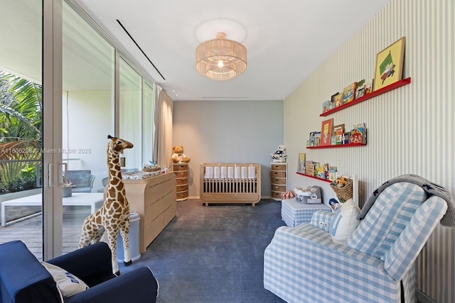 4700 N Meridian Ave, Miami Beach, FL 33140 - bedroom with access to exterior and carpet floors
