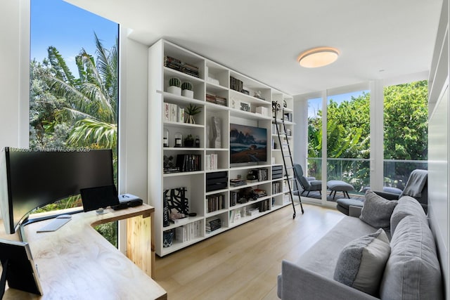 4700 N Meridian Ave, Miami Beach, FL 33140 - living area featuring wood finished floors and a wall of windows