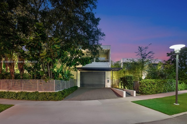 4700 N Meridian Ave, Miami Beach, FL 33140 - view of front of property featuring driveway, stucco siding, and a garage