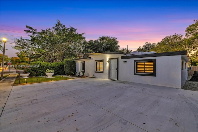13550 NW 5th Ave, North Miami, FL 33168 - mid-century inspired home featuring a patio area and stucco siding