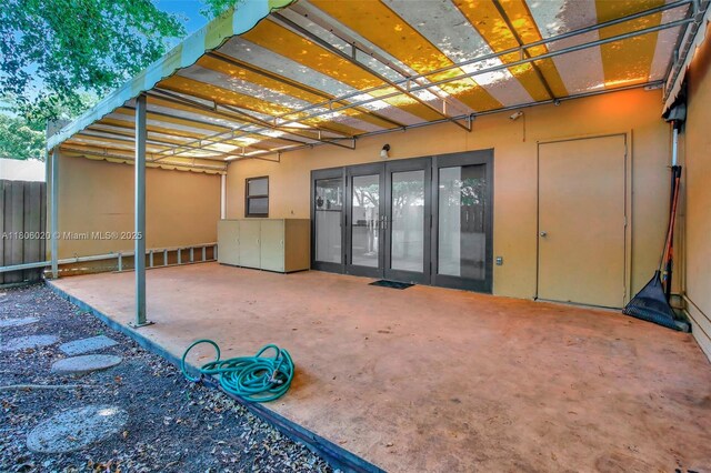 6703 Kingsmoor Way, Miami Lakes, FL 33014 - view of patio with french doors