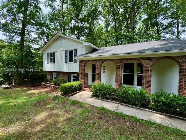 902 Vickie Dr, ,, NC 27511 - tri-level home with brick siding and roof with shingles